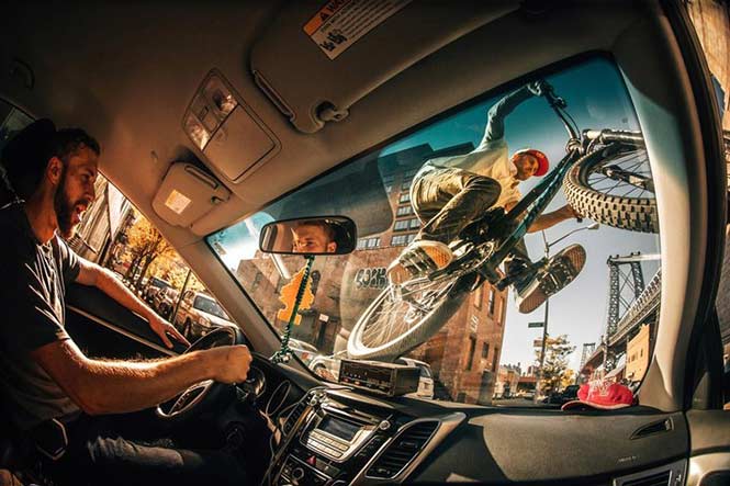 New Creativity: Ale Di Lullo, Italy for his fun shot of Aaron Chase riding his mountain bike on the windshield of a NYC cab. 