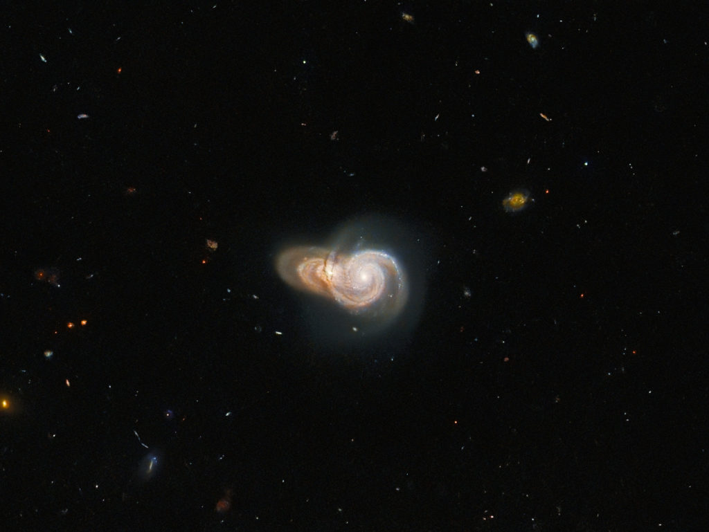 Hubble: Καταγράφει οπτική ψευδαίσθηση όπου δύο σπειροειδείς γαλαξίες μοιάζουν να συγκρούονται!