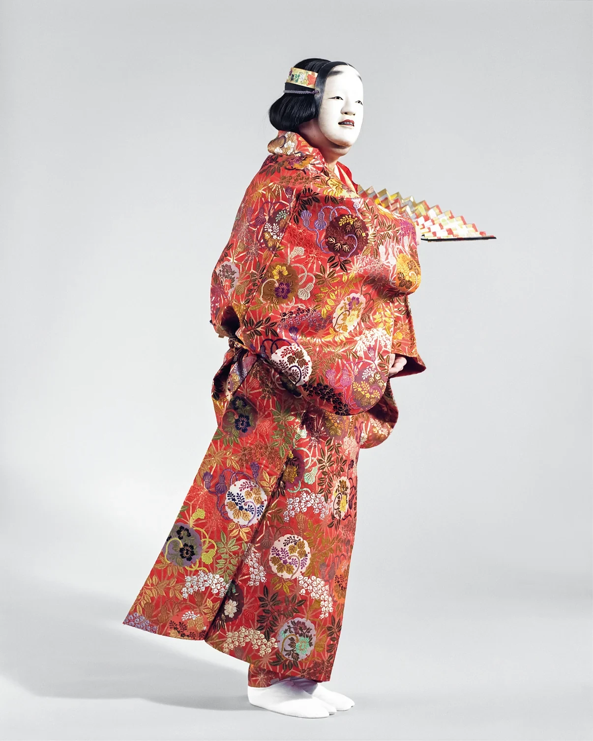 Portrait of a Noh performer with a mask
