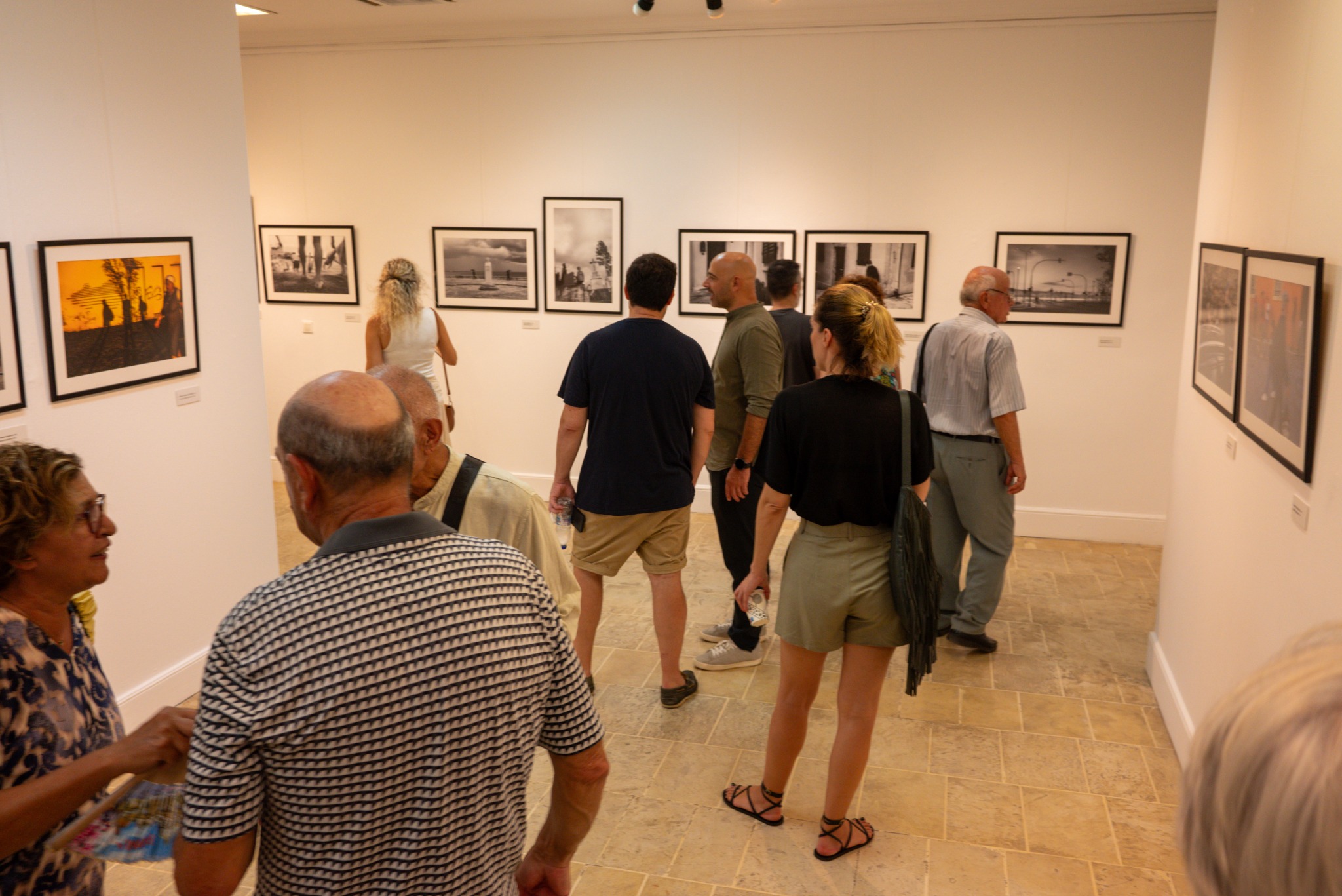 Visitors at the “My City” photography exhibition by Group 28mm in Corfu
