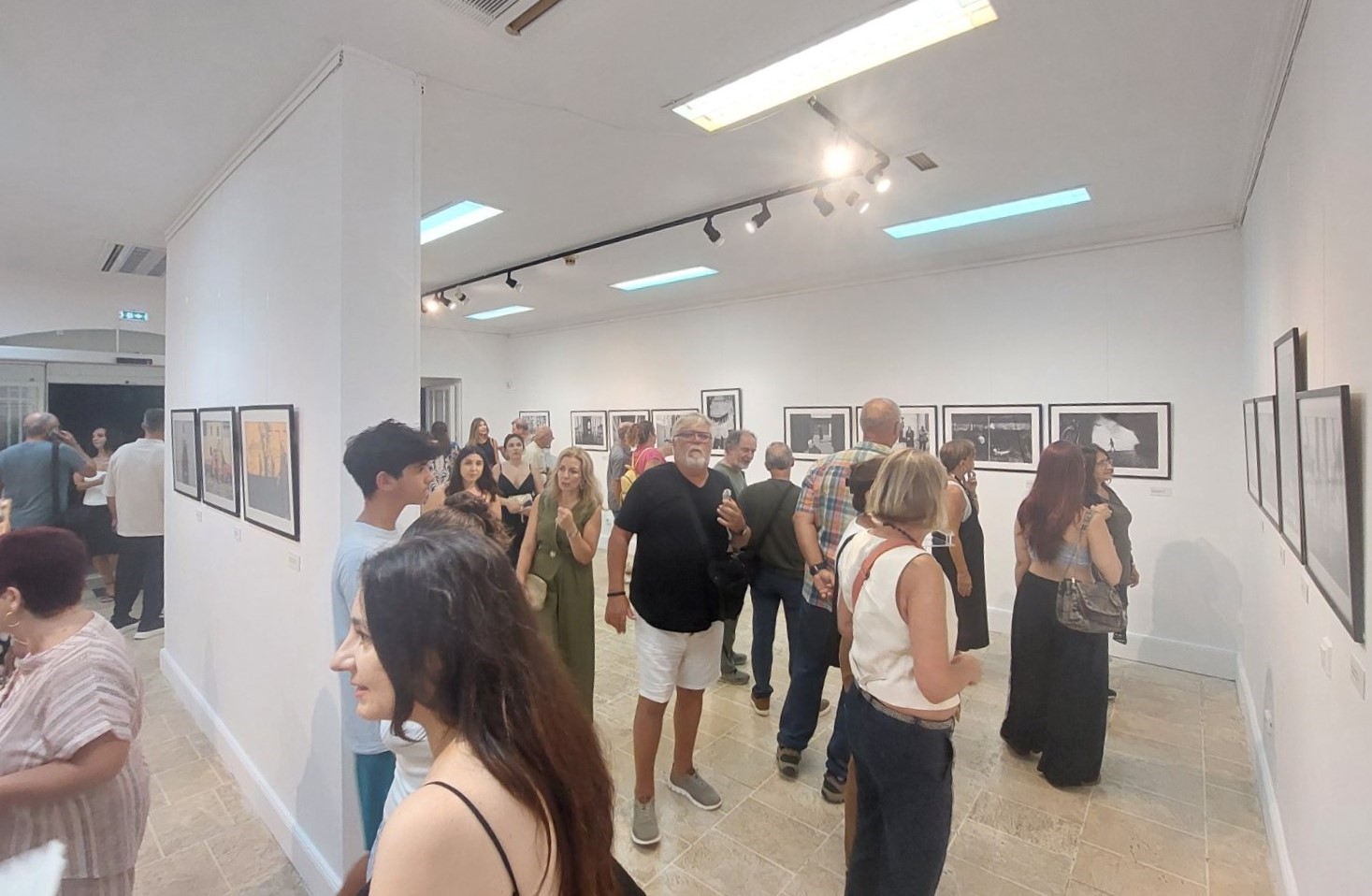 Audience at the “My City” photography exhibition at the Corfu Municipal Gallery
