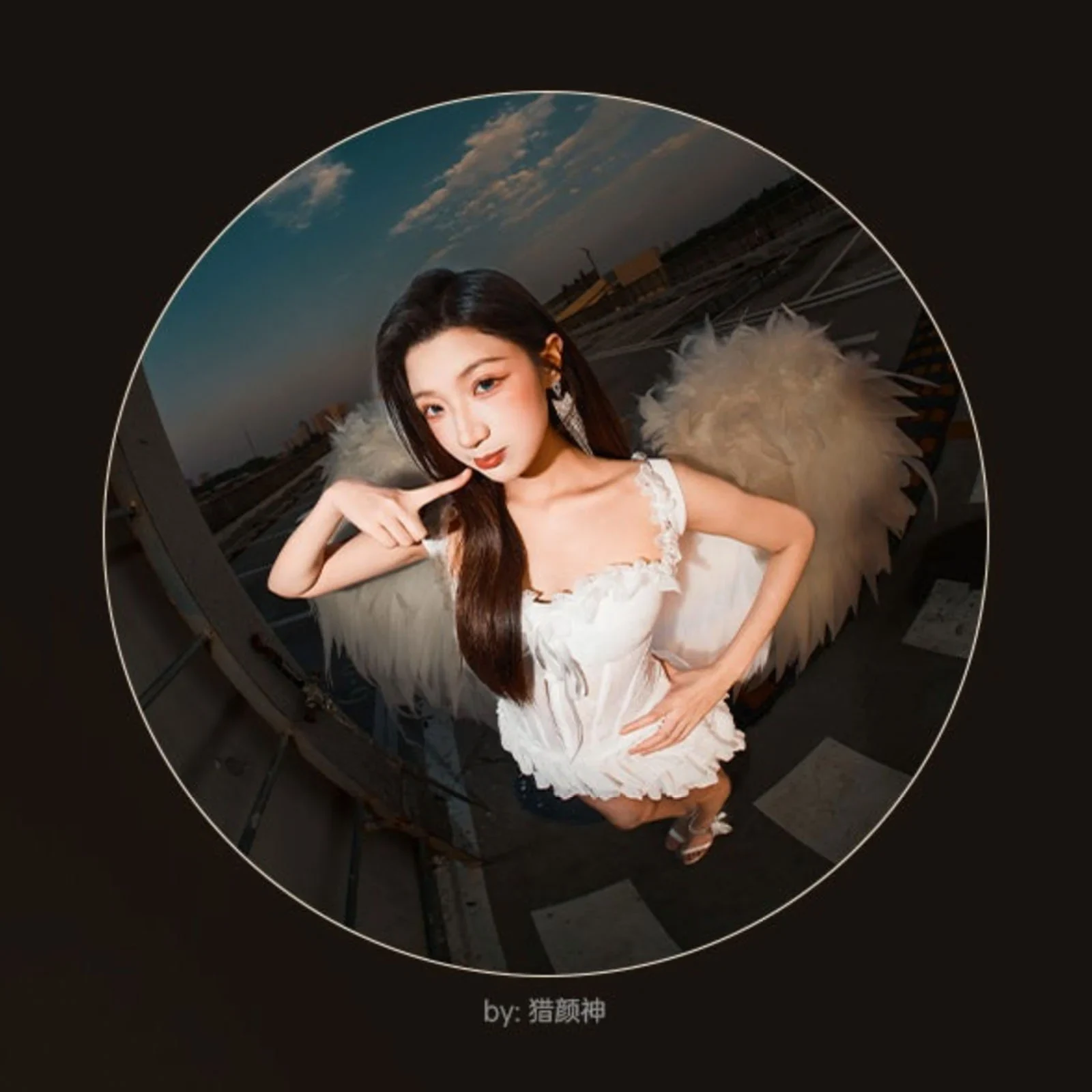 Portrait of a woman with white wings in circular fisheye