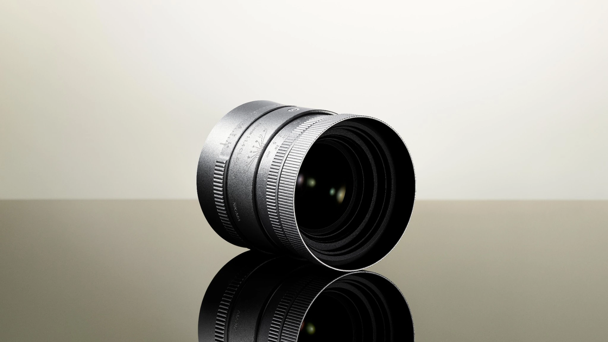 Sigma 50mm F1.4 CL DG Contemporary with metal lens hood