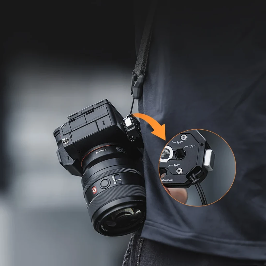 Camera attached to a carrying strap using a FALCAM F38 plate