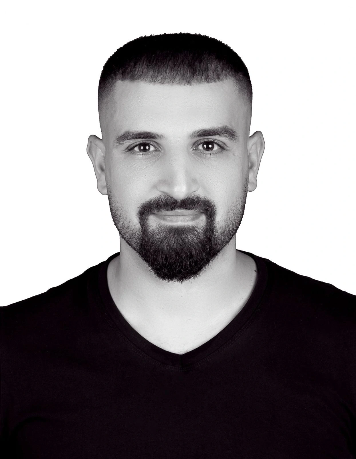 Black-and-white portrait of Ali Jadallah