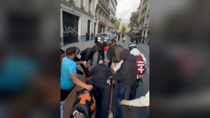 Paris photographer nearly died after alleged police grenade strike while covering a protest