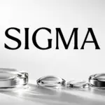 Το αυθεντικό λογότυπο SIGMA σε ασπρόμαυρη σύνθεση με οπτικό γυαλί και μεταλλικούς δακτυλίους.